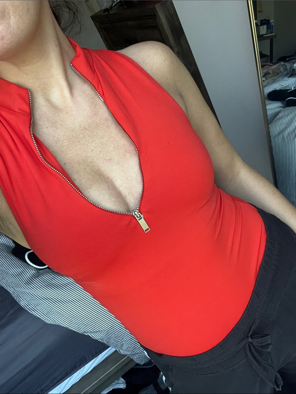 Sleeveless Red Zip-Front Bodysuit